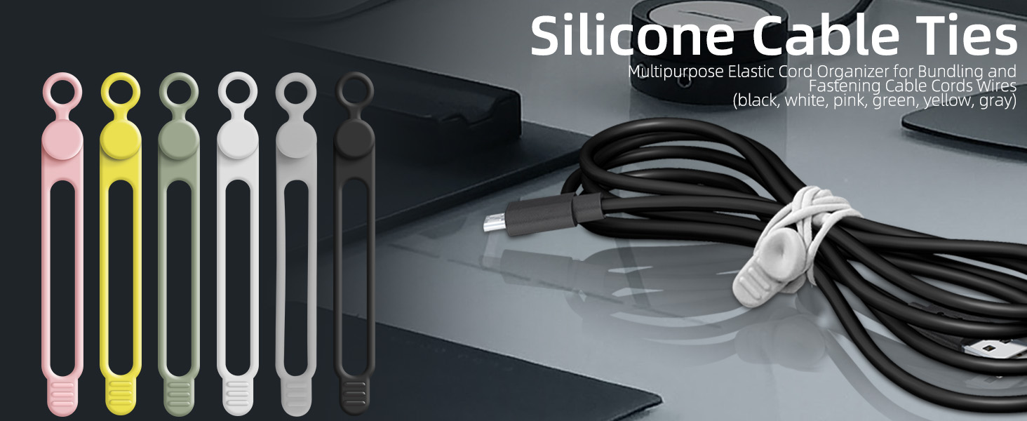 Colorful silicone cable ties in various pastel shades, displayed alongside black cables on a dark surface.
